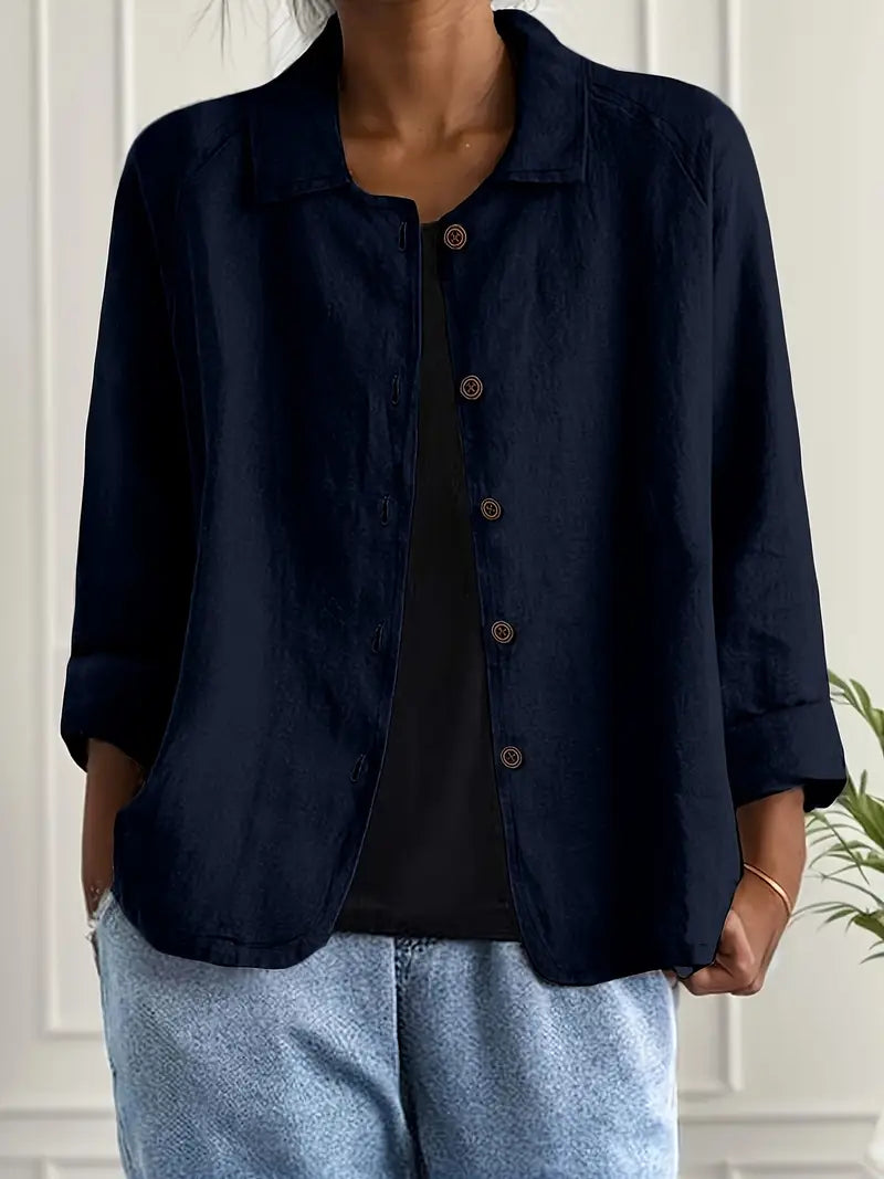 Women's button-front collared shirt, relaxed fit, three-quarter sleeve, a classic and versatile casual top.