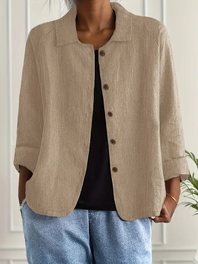 Comfortable women's button-front top, relaxed fit, perfect for casual spring & summer outfits.