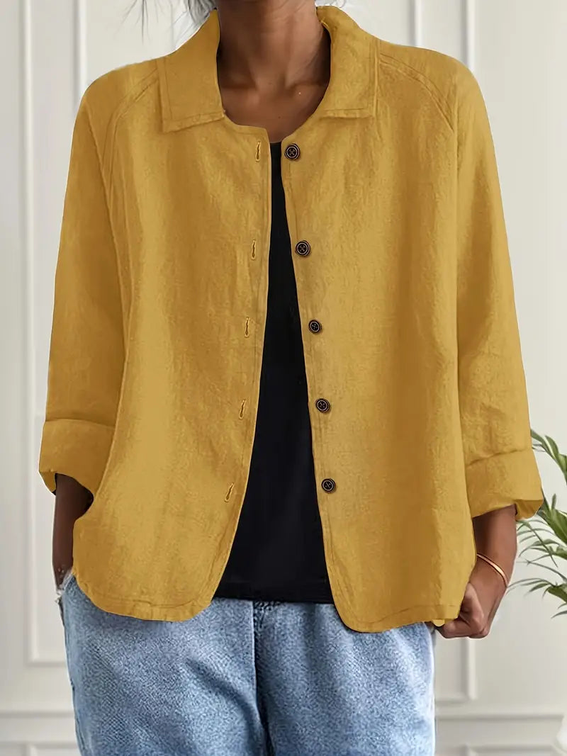 Lightweight women's button-front top, relaxed fit, three-quarter sleeve for cool summer & spring wear.