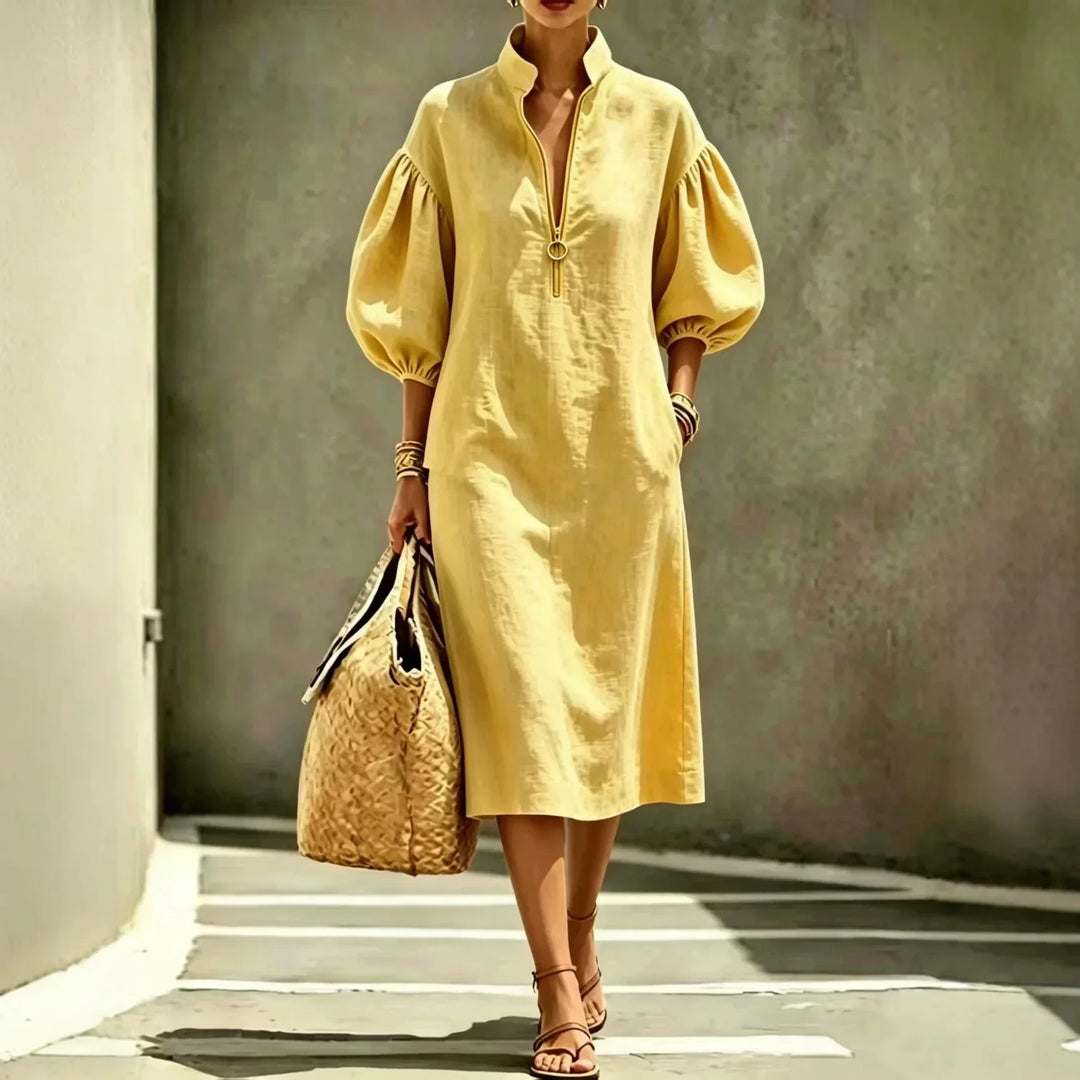 Versatile women's everyday midi dress with a modern half-zip design and comfortable, elegant bubble sleeves.