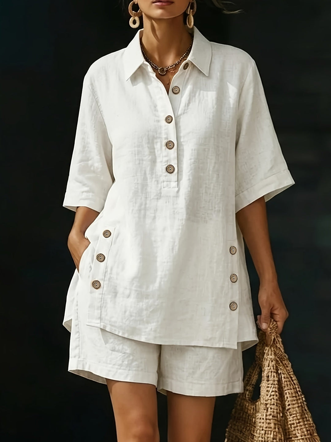 Women's casual chic two-piece set: collared button-detail top & high-waisted shorts. Perfect for summer resort wear.
