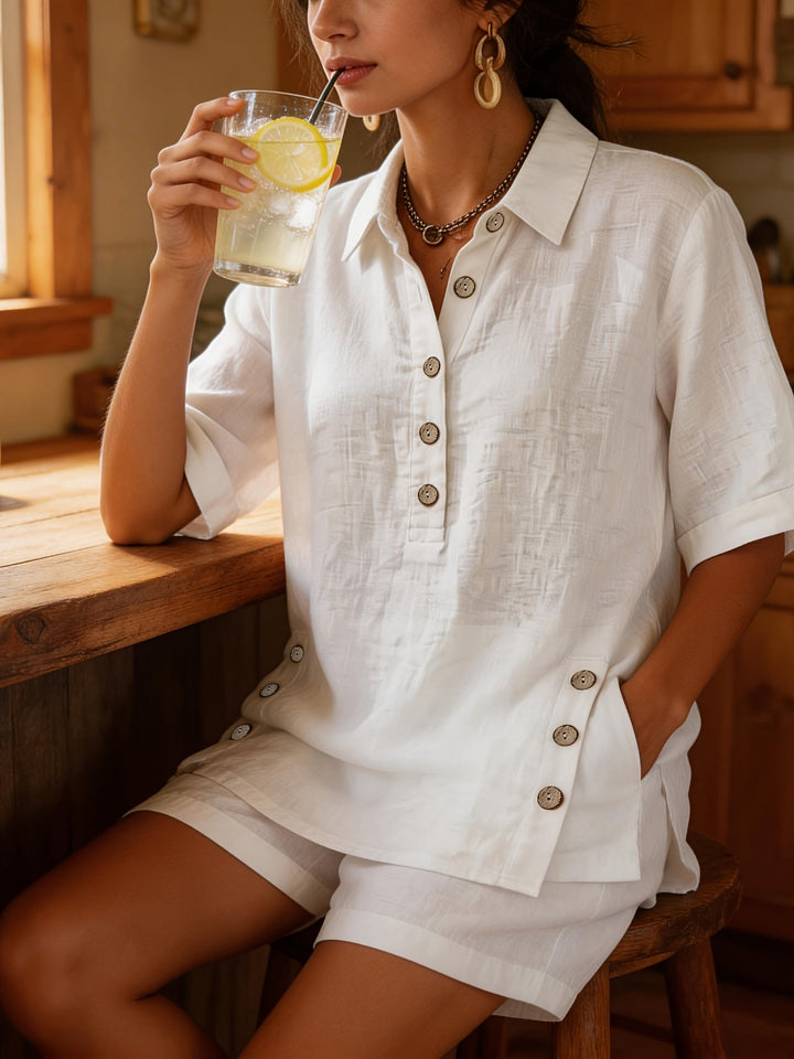 Women's high-waisted shorts with a comfortable fit, paired with a matching collared top in a summer two-piece set.