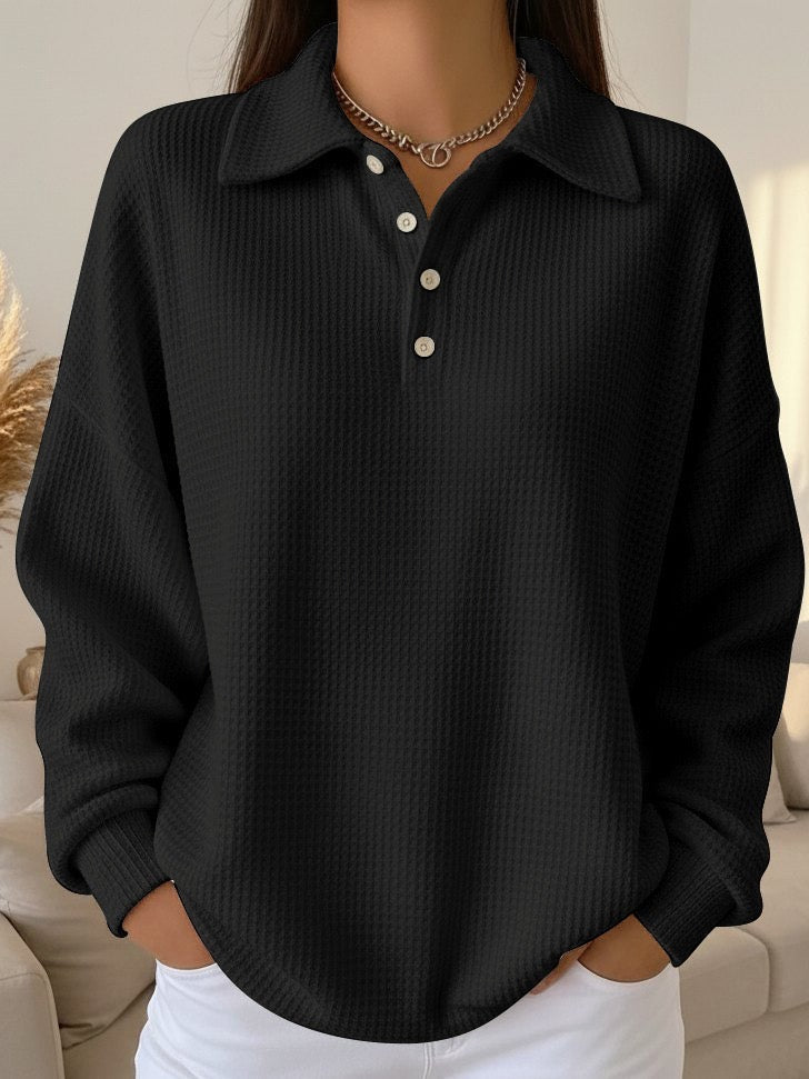 Stylish women's long-sleeve collared Henley jumper, ideal for smart casual autumn wear.