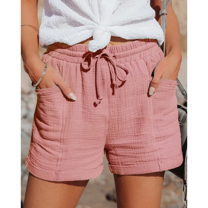 Women's casual drawstring shorts with pockets, perfect for summer comfort and relaxed everyday wear.