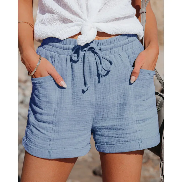 Comfortable pull-on women's shorts with an adjustable drawstring waist and practical side pockets.