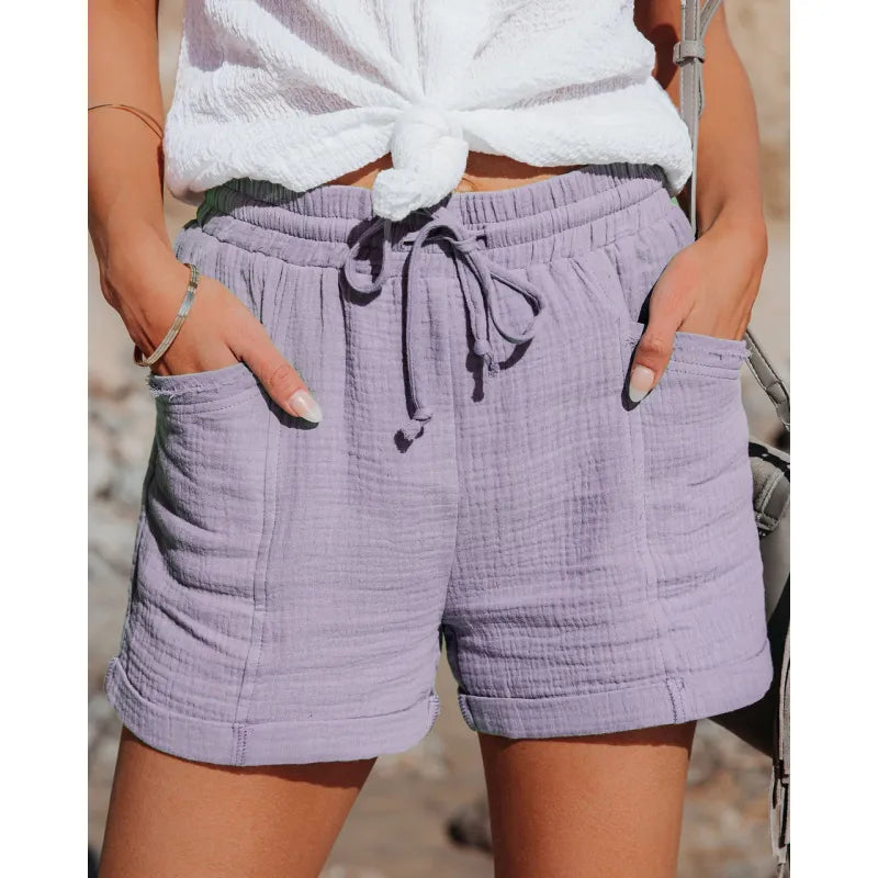 Versatile women's casual drawstring shorts, perfect for lounging, beach, or urban summer adventures with pockets.