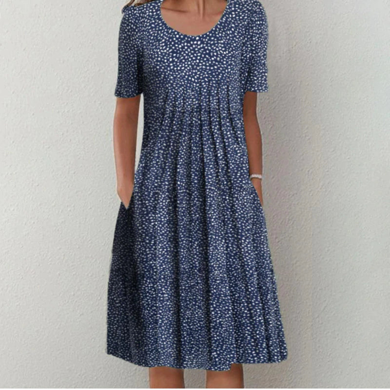 Pretty floral casual dress for women, boasting short sleeves and essential pockets, great for daily fashion.