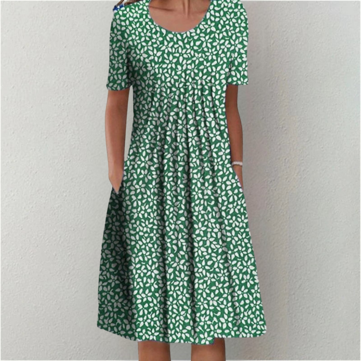 Women's short sleeve floral midi dress with pockets, a comfortable and stylish choice for casual outings.