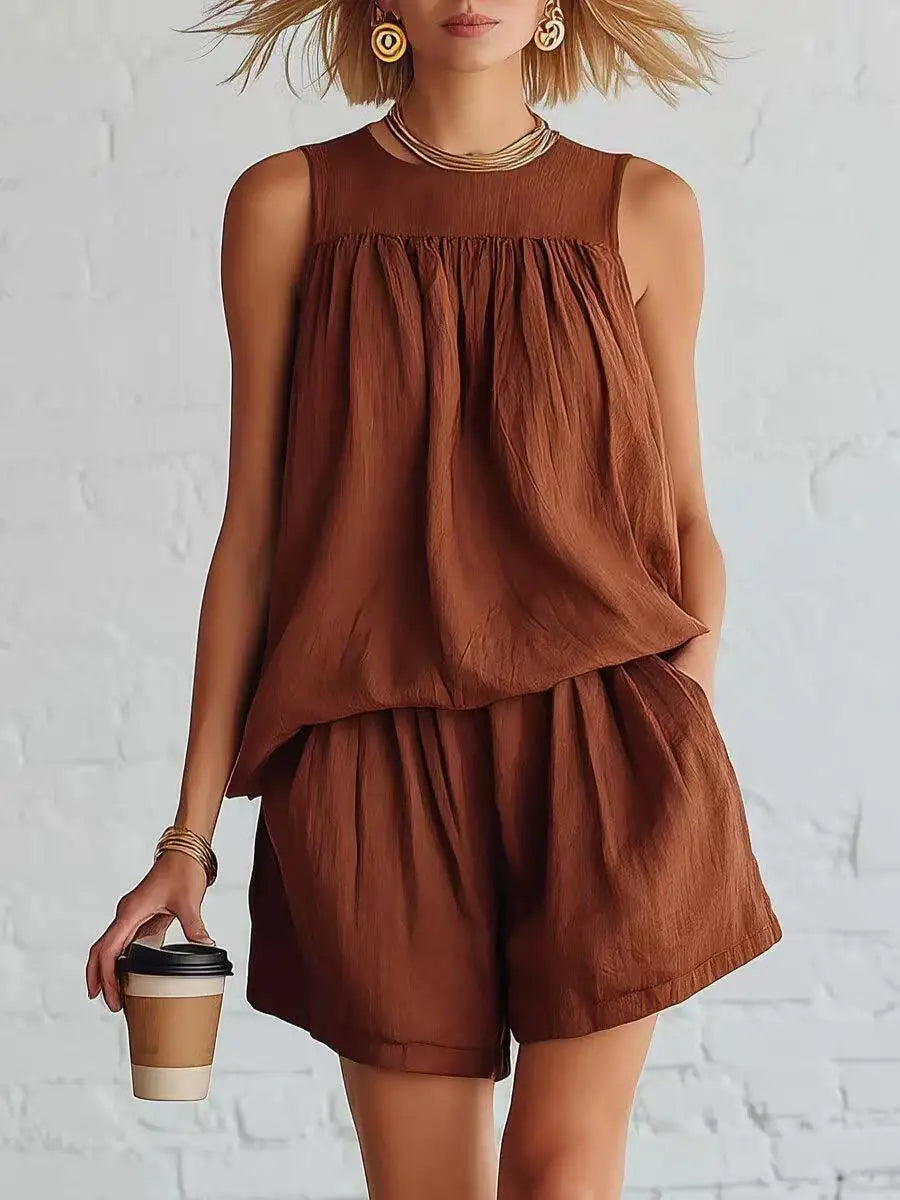 Women's summer fashion shorts set. Gathered high-waisted shorts & sleeveless top. Effortless casual two-piece outfit.