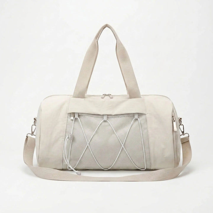Spacious women's fitness duffel bag, ideal for the gym, sports, or a quick weekend getaway.
