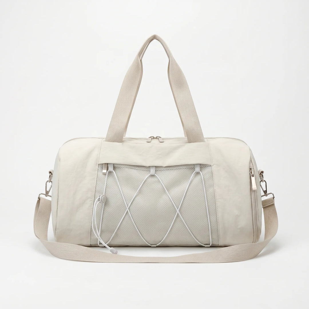 Durable women's sports bag, a practical carryall duffel for the gym, yoga, or athletic training.