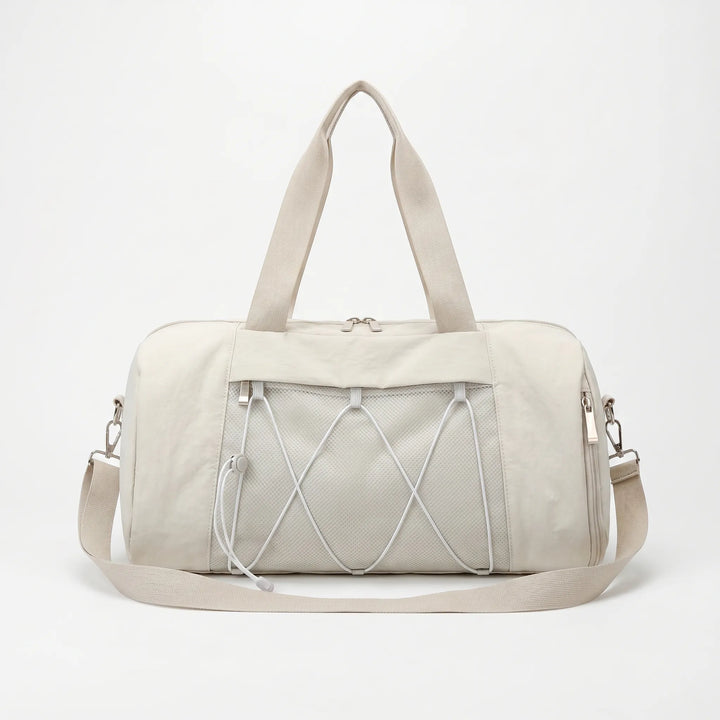 Durable women's sports bag, a practical carryall duffel for the gym, yoga, or athletic training.