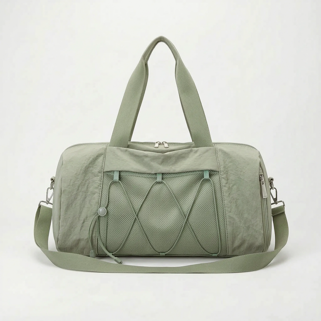 Modern women's gym duffel, designed for comfortable carrying to fitness classes & short trips.