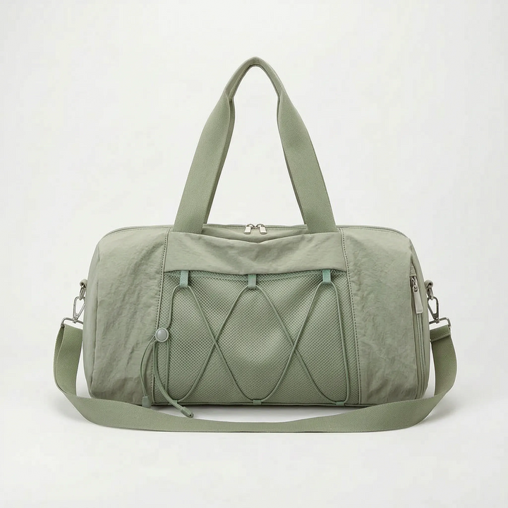 Modern women's gym duffel, designed for comfortable carrying to fitness classes & short trips.
