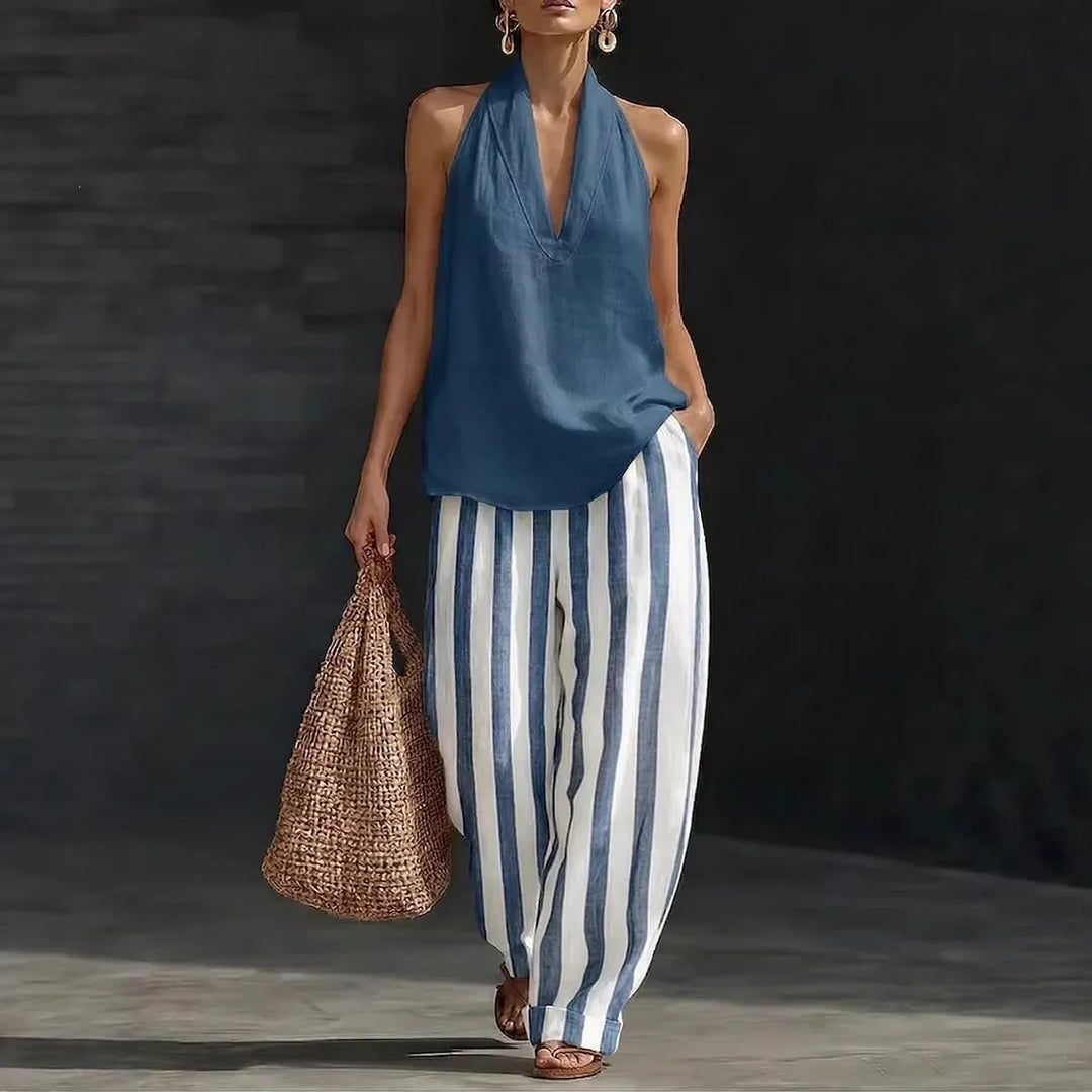 Chic women's casual matching set featuring a halter top & wide leg pants. Ideal for beach or everyday wear.