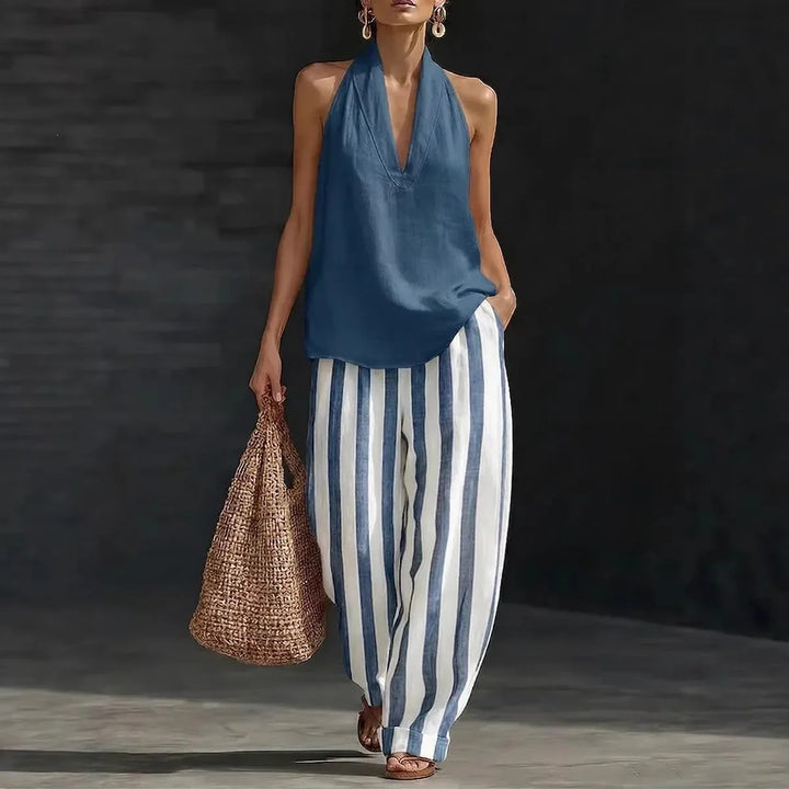 Chic women's casual matching set featuring a halter top & wide leg pants. Ideal for beach or everyday wear.
