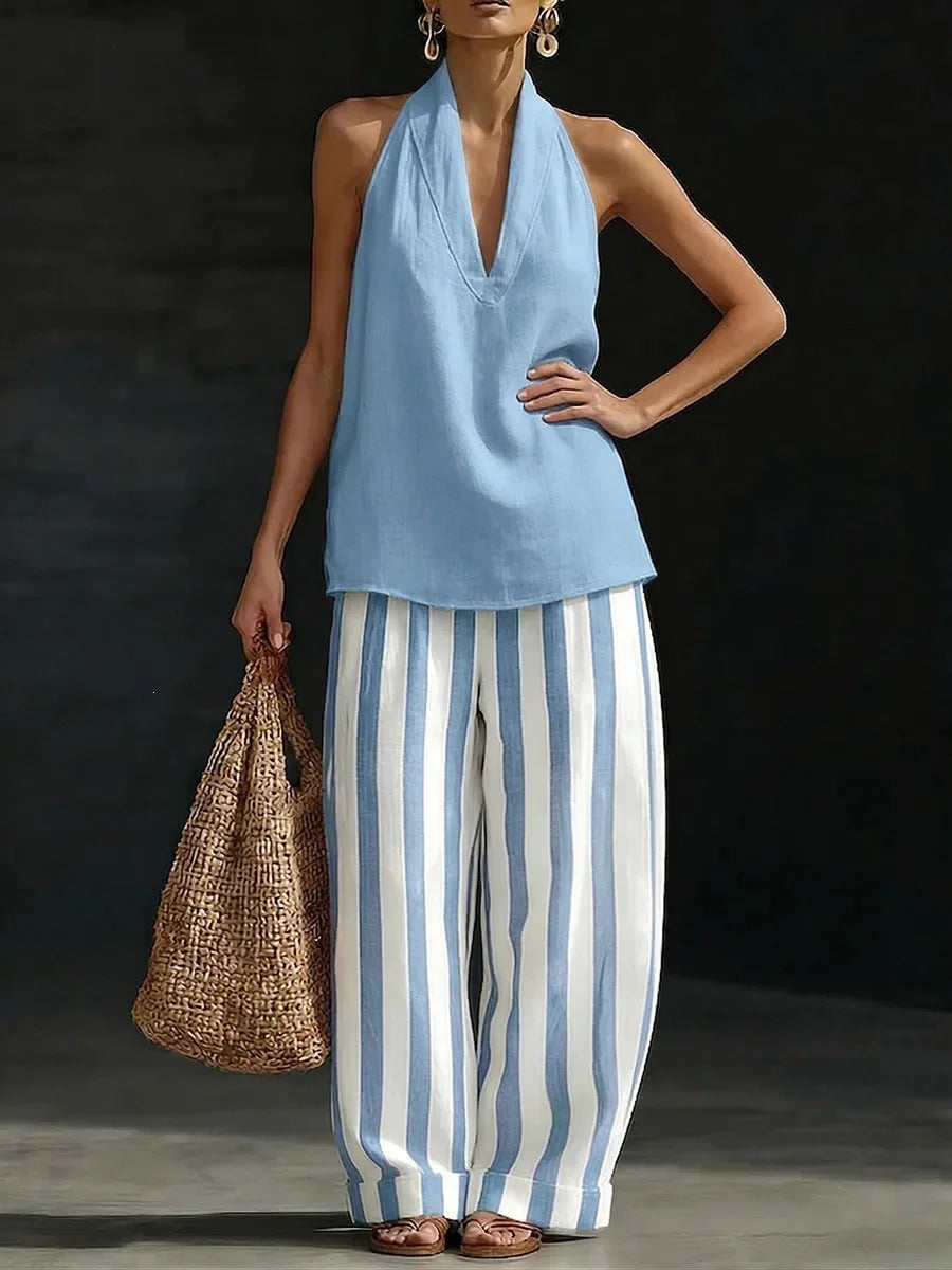 Trendy women's summer outfit: high-waist wide leg pants & stylish halter top matching set.