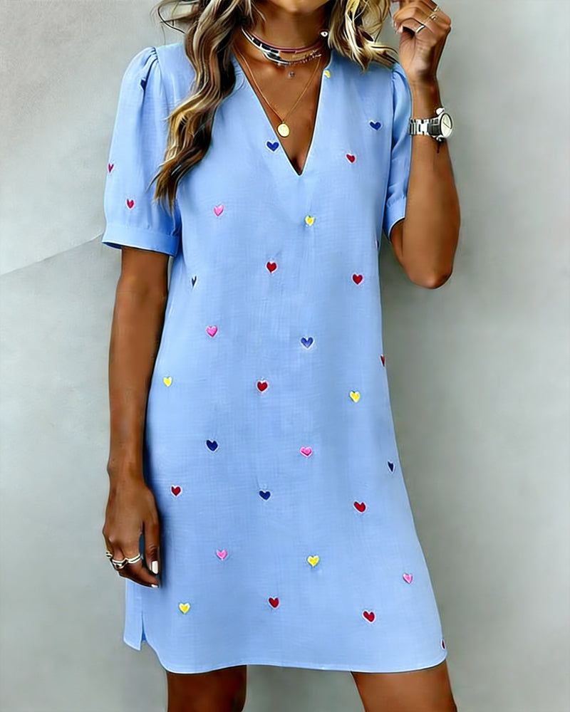 Relaxed fit women's heart print V-neck dress, perfect for spring and summer casual outings.
