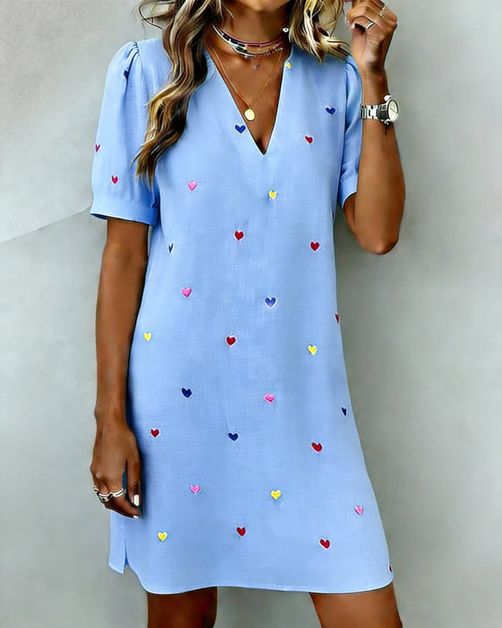 Relaxed fit women's heart print V-neck dress, perfect for spring and summer casual outings.