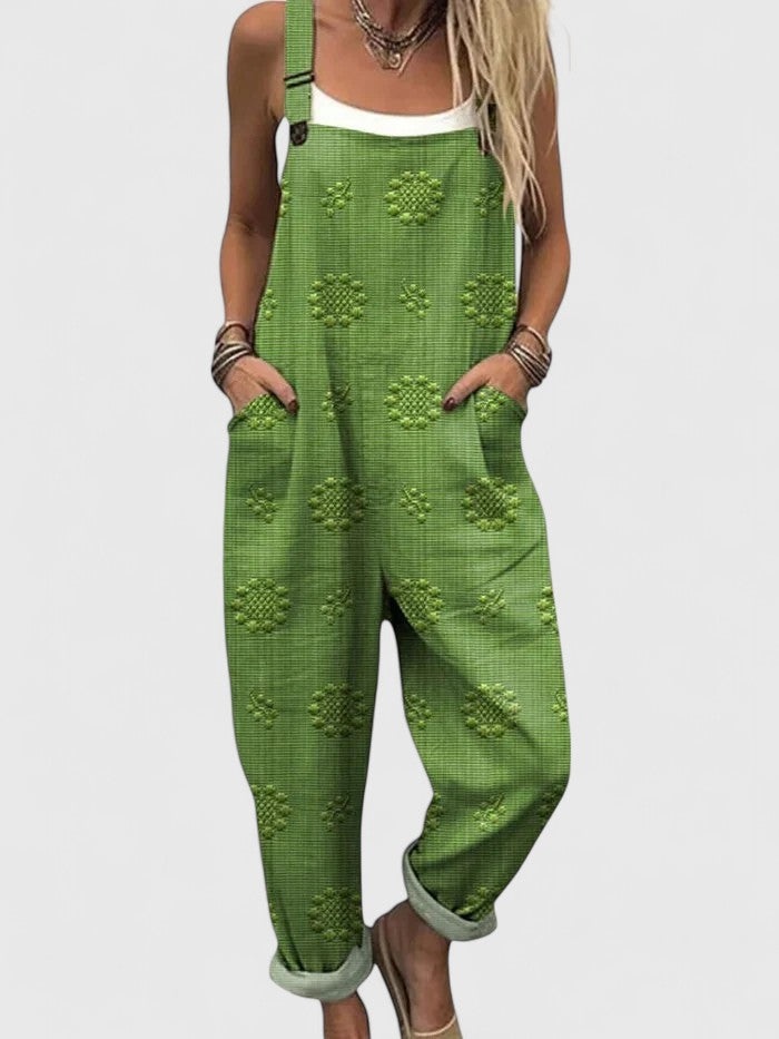 Bohemian women's floral embroidered jumpsuit with relaxed fit & adjustable straps for spring/summer style.