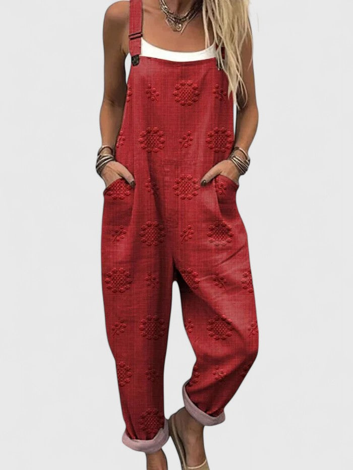 Comfortable women's casual jumpsuit featuring intricate floral embroidery, side pockets & easy wear design.