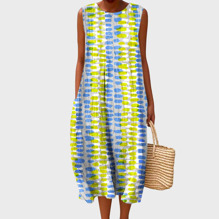Comfortable women's sleeveless knee-length dress with a relaxed A-line fit, ideal for versatile summer casual wear.