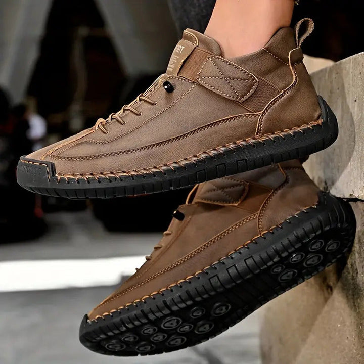 Neutral-toned women's casual sneakers, lace-up design with stitched details for versatile style.
