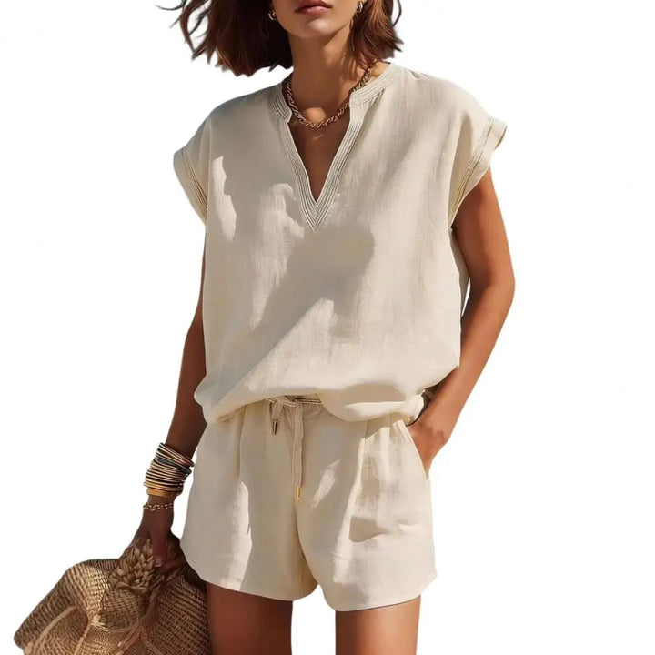 Elegant women's matching linen shorts set with a chic notch V-neck top, versatile for resort & casual.