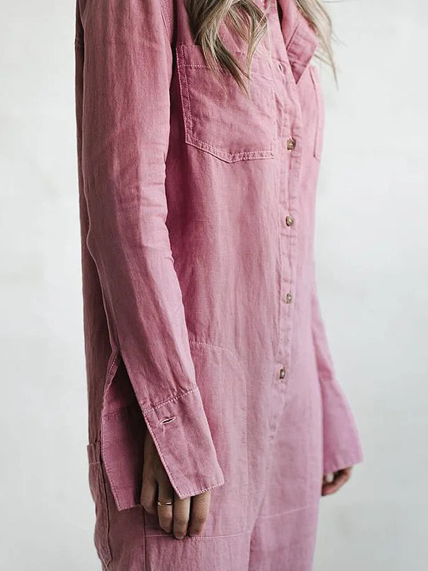 Close-up of a women's long sleeve button-up jumpsuit, featuring button detailing and comfortable, relaxed fabric.