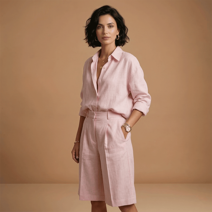 Women's long sleeve pleated shirt and matching shorts set. Relaxed fit for comfortable everyday casual clothing.