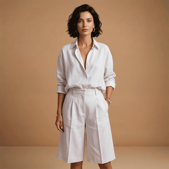 Elegant women's pleated long sleeve shirt & shorts set. Relaxed fit two-piece, perfect for a stylish casual look.