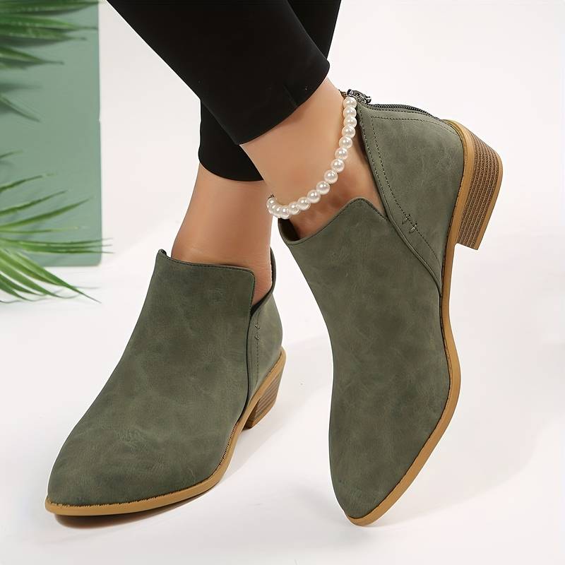 Women's casual low heel slip-on ankle boots in a versatile style for comfortable everyday wear.