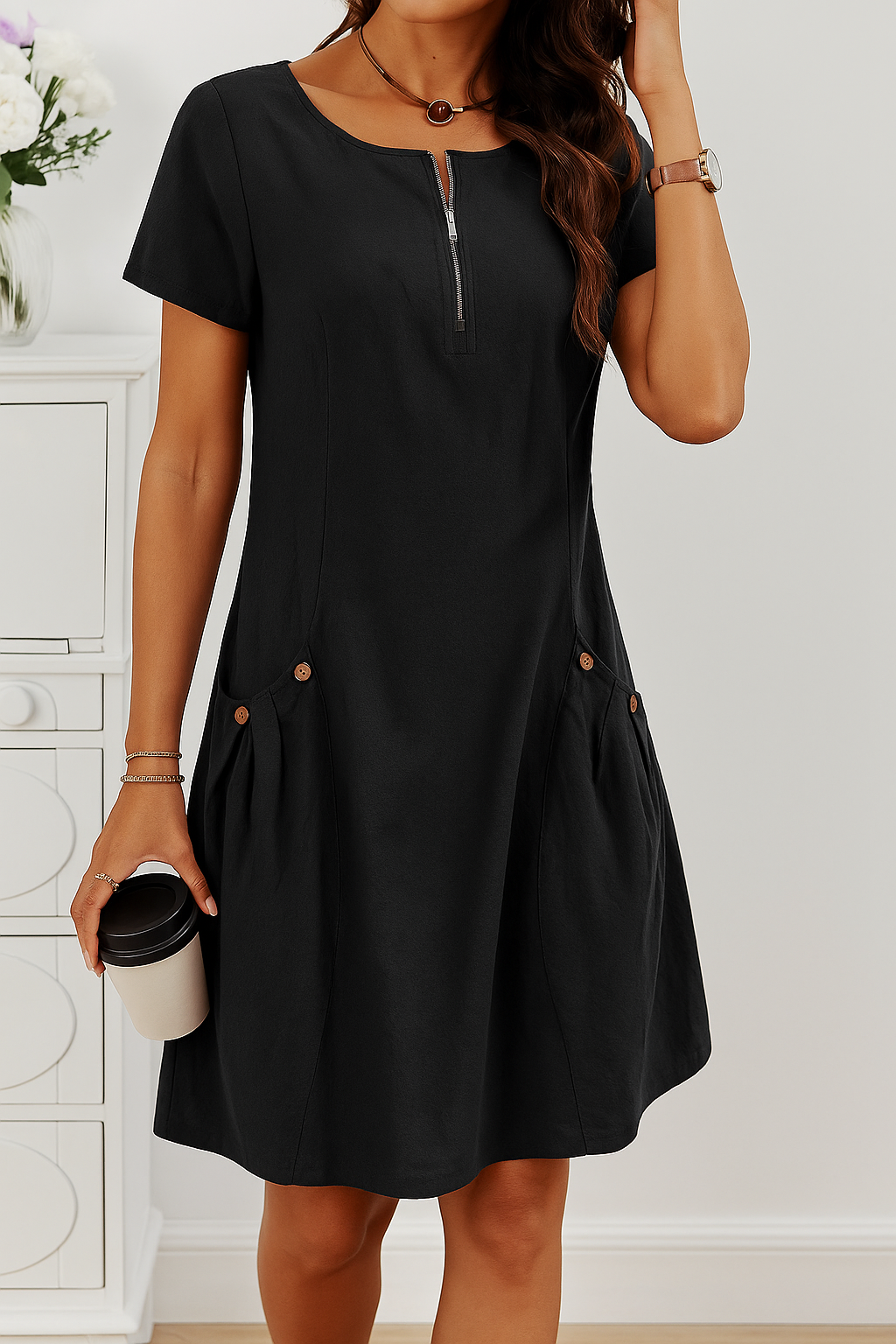 Versatile women's short sleeve midi dress with a chic zip front design & functional button pockets. Utilitarian style.
