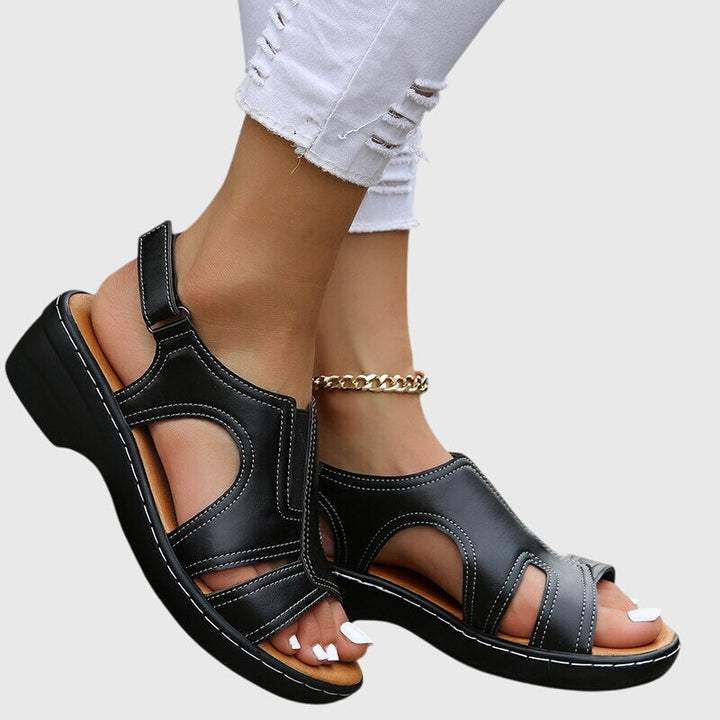 Brown women's casual peep toe wedge sandals with adjustable slingback strap. Perfect for summer style.