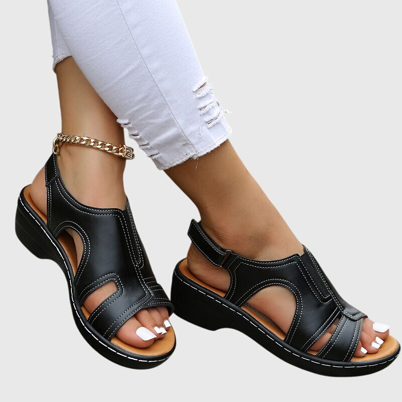 Comfortable women's casual peep toe wedge sandals with supportive slingback. Ideal summer footwear.