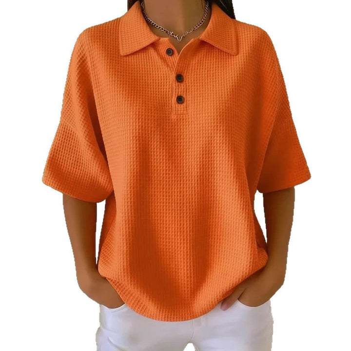 Versatile women's short sleeve polo blouse. Loose fit, perfect for casual spring & summer style.