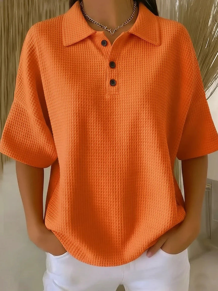 Women's spring-summer polo neck top. Loose fit, short sleeves, ideal for casual everyday comfort.