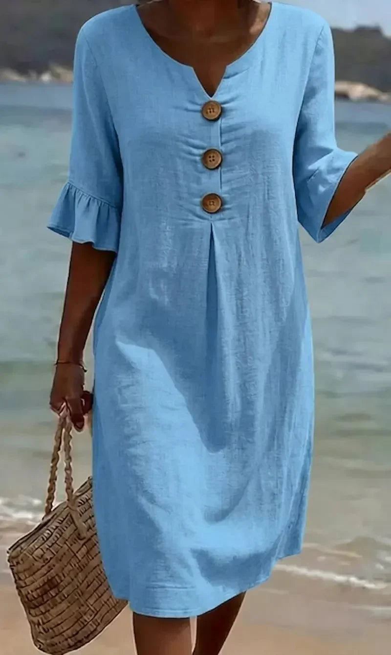 Flowy women's everyday midi dress with ruffle sleeves & full button-front. Relaxed fit for summer style.