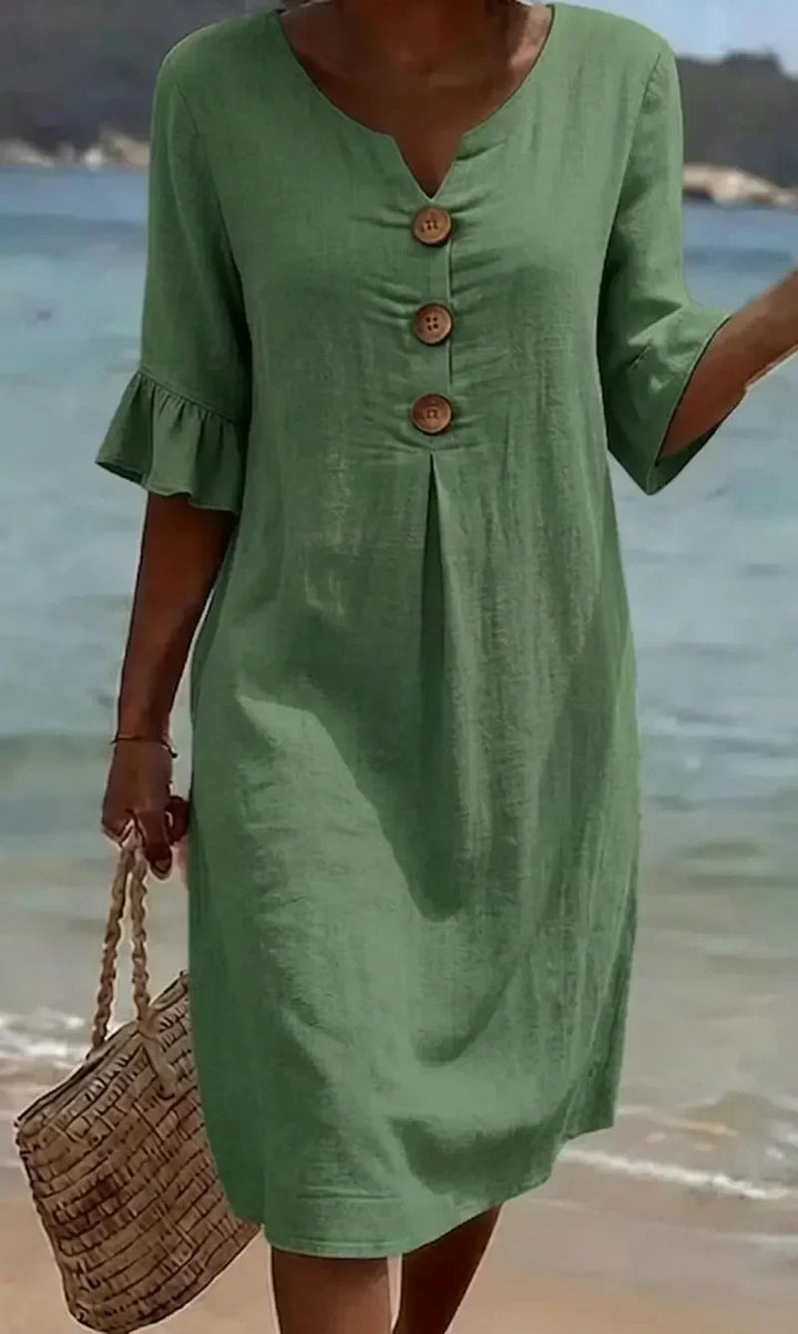 Stylish women's casual midi dress featuring ruffle sleeves & a button-front. Perfect for summer vacations.