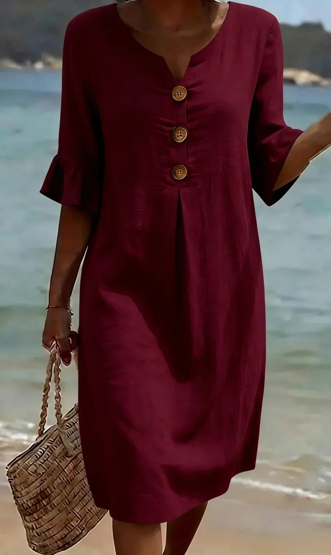 Styled women's casual button-front midi dress with ruffle sleeves. Versatile summer & vacation essential.