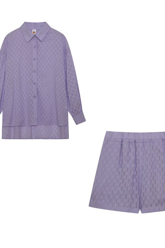 Women's casual wear shirt & short set. Breathable fabric for summer comfort and style.