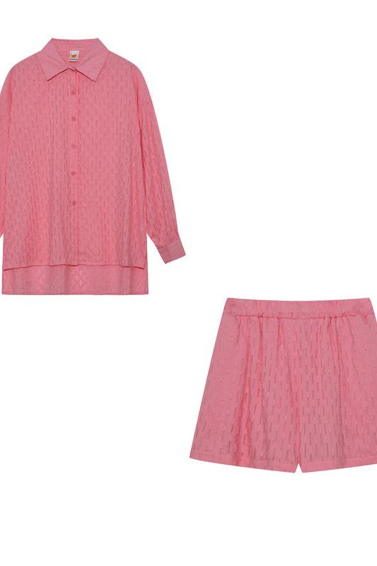 Elegant yet casual women's shirt & short set. Perfect for warm weather fashion.