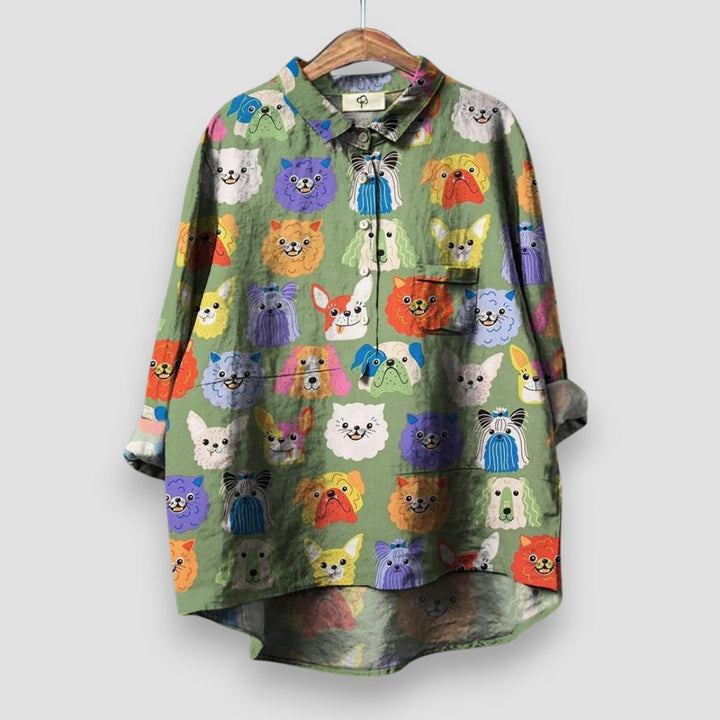 Playful dog print short sleeve women's shirt. Relaxed fit casual top, perfect for everyday summer wear.