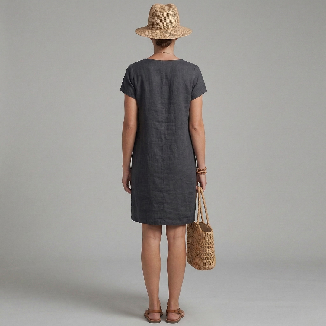 Comfortable women's everyday casual dress. Short sleeves, pockets, and a loose fit for summer and hot weather.