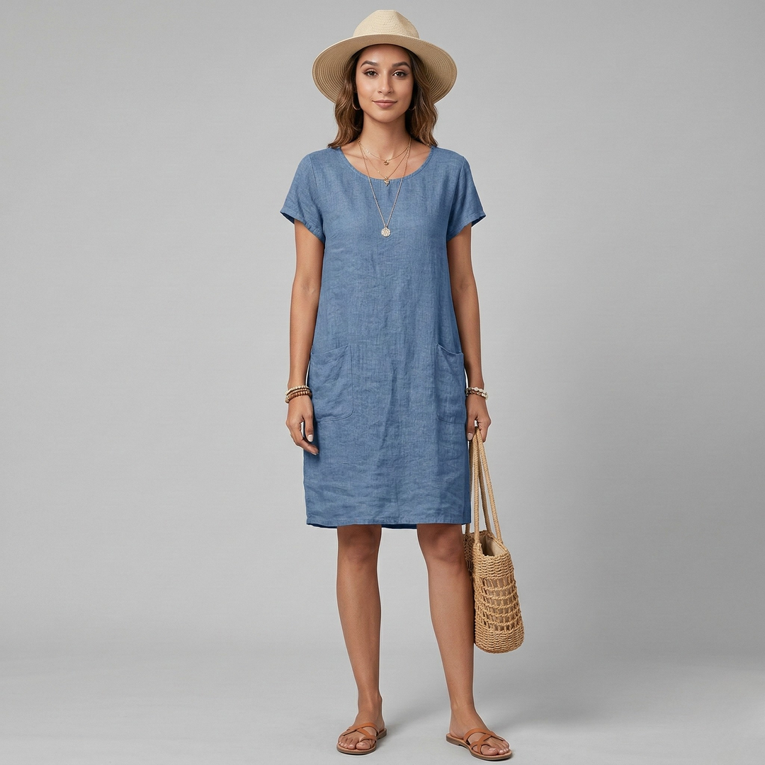 Stylish women's short sleeve pocket dress, available in plus sizes. A versatile loose-fit summer dress for any occasion.