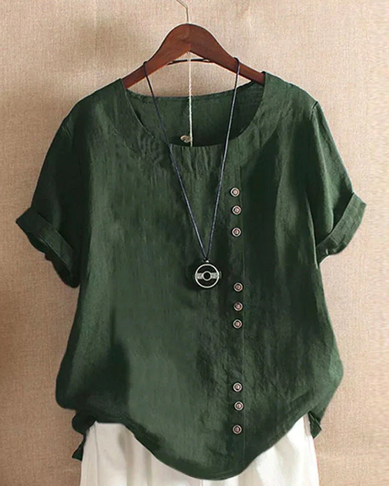 Fashionable women's short sleeve casual top. Relaxed fit & button front offer comfort & style.