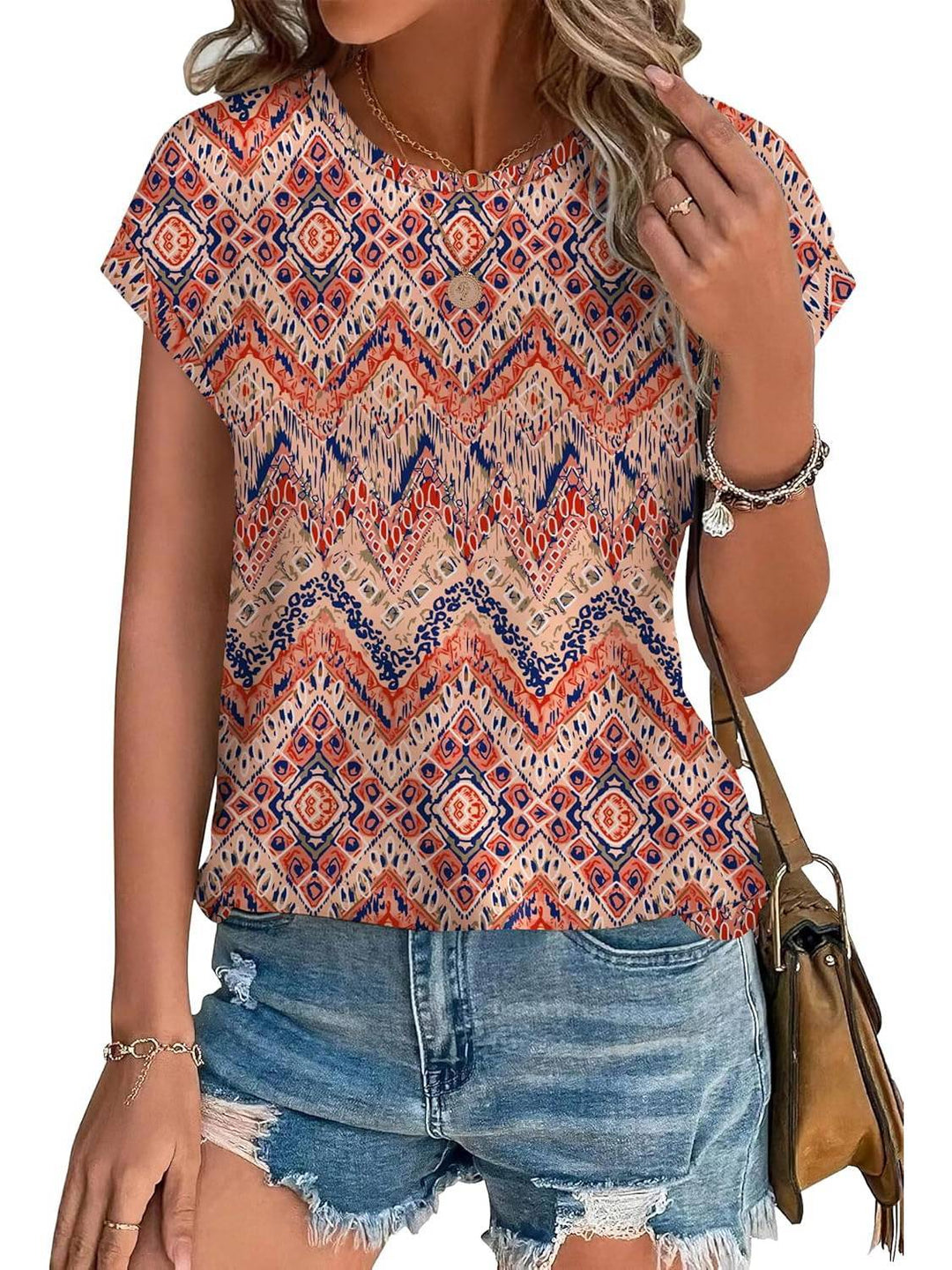 Comfortable women's leaf print blouse with crew neck, ideal for spring everyday wear.