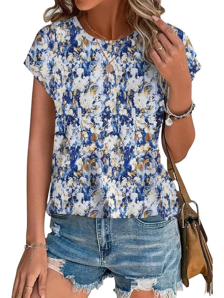 Relaxed fit women's top featuring a stylish leaf print and classic crew neck design.