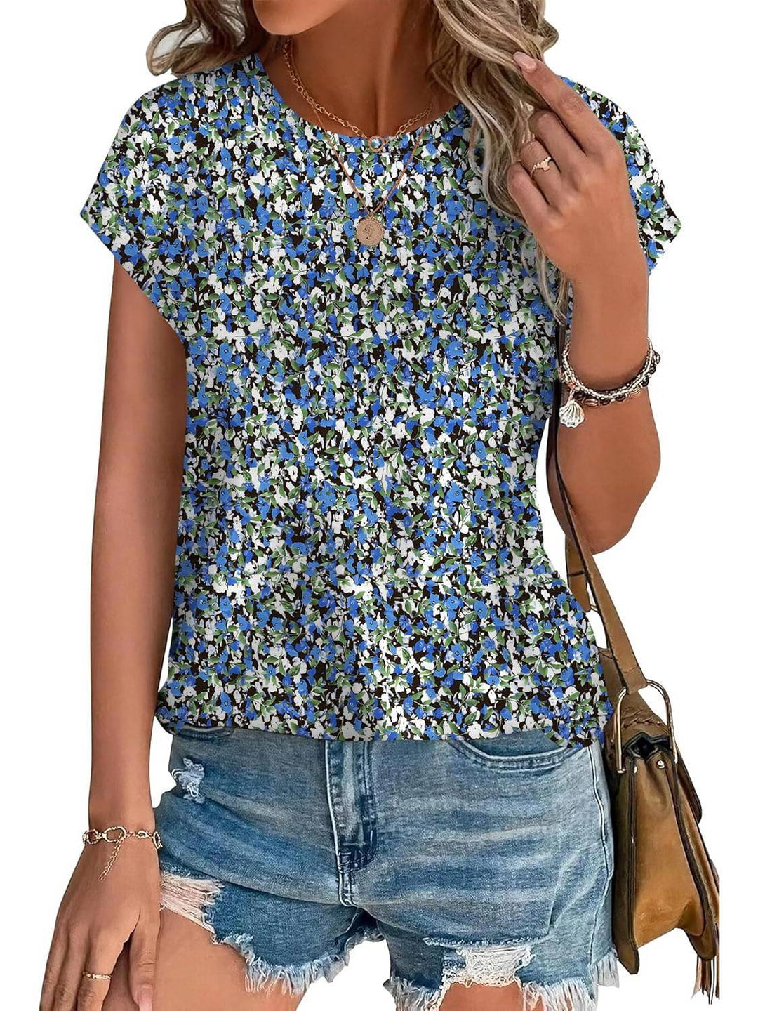 Soft women's casual leaf print blouse with crew neck, offering a comfortable relaxed fit.