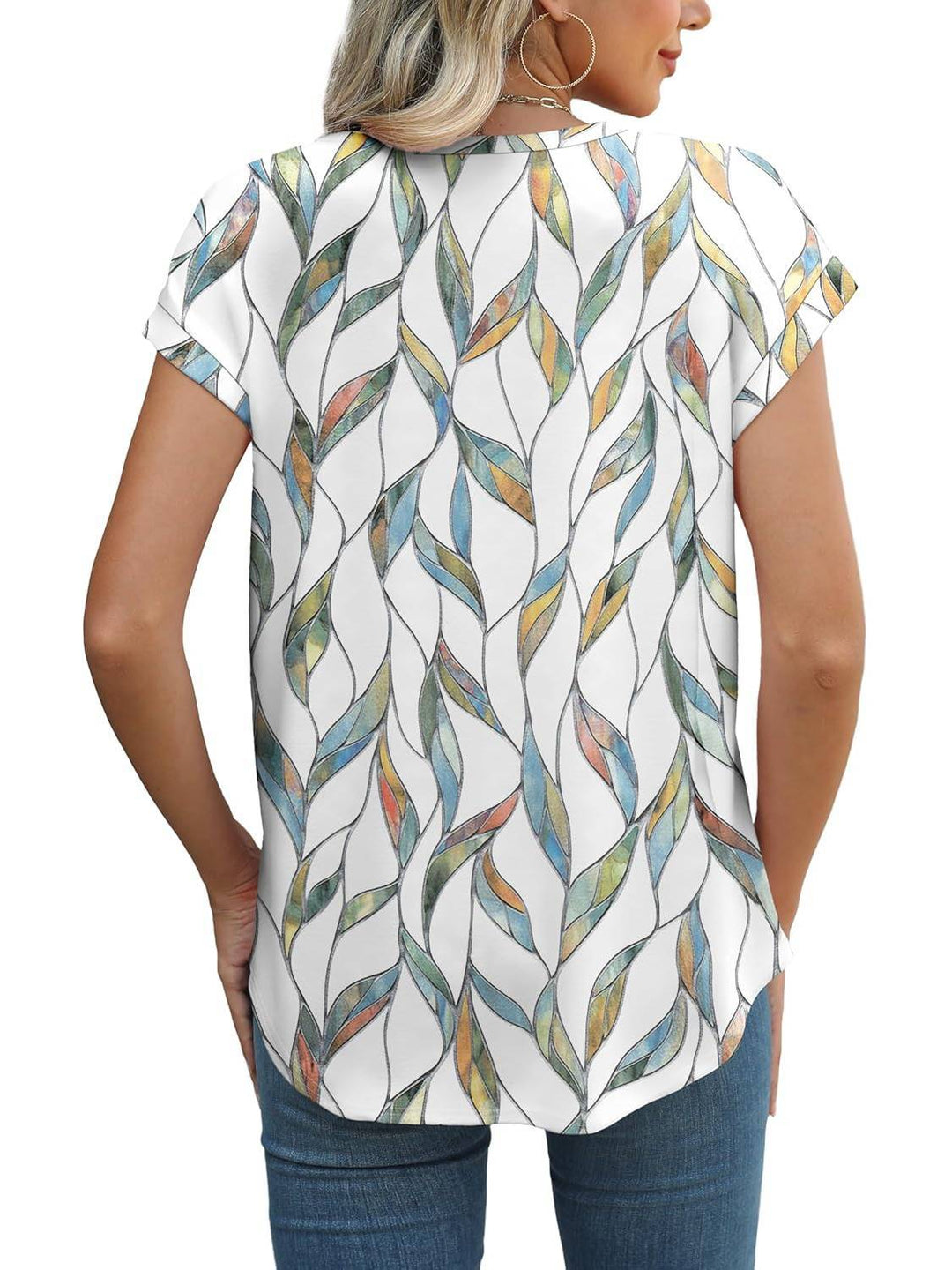 Stylish women's short sleeve top with a botanical leaf print and comfortable crew neck.